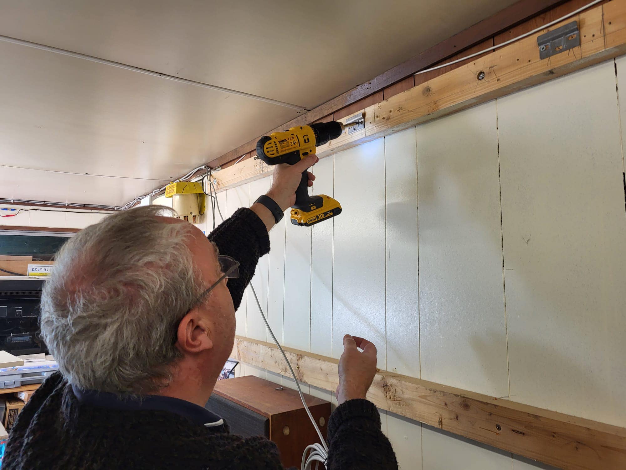 Peter fitting cupboards
